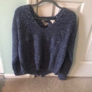 Blue sweater with lace up back